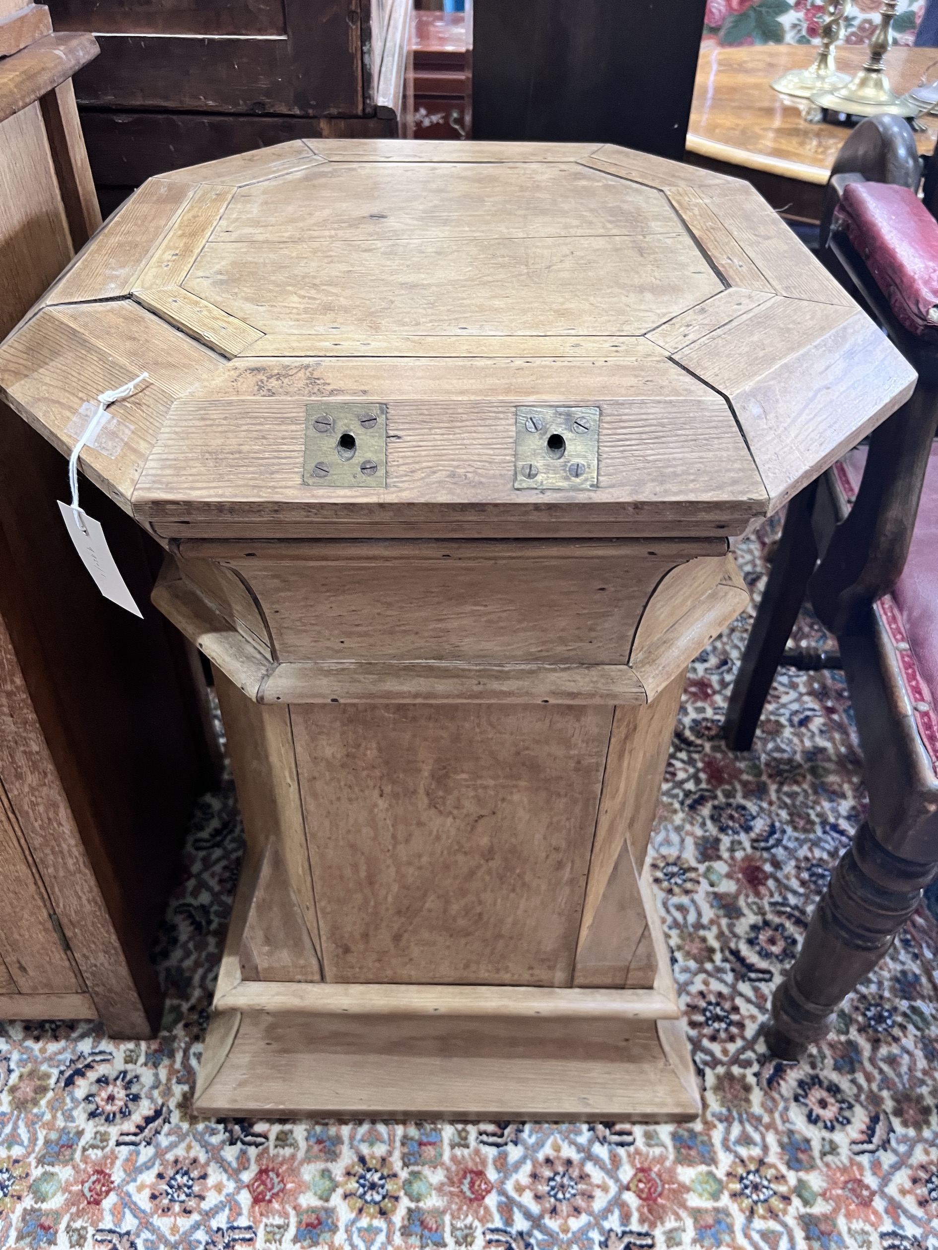 A 19th century Gothic pine octagonal plinth, width 54cm, height 77cm